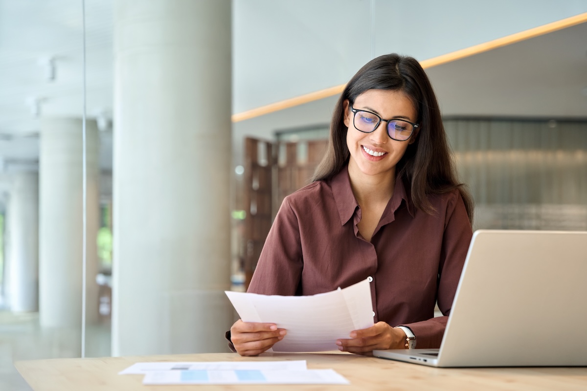 Smiling latin hispanic business woman working on laptop computer reading financial document report in office. Accountant entrepreneur manager businesswoman doing paperwork using pc. Copy space SSUCv3H4sIAAAAAAAAA3VSy47jIBD8lz4TCTBg8FfsbQ7RHDAwDhrbOIDnIYt/X+FsIme0c+umu6qrutnAW+hACGsI6fGpl7Q5EfKGT1L0bydDpFGKcUUcBQRWZwcdaRhuGROYKiIUxhgj6HXyBroN/DiuKUedfZihwwiim62Le+iszyF6PUKHC4KUdV6TSxWWLmvOLqYczDt0tEWgbejdIy8IjM5uCNHfAP8Gnrf6Dh0AgrT2NSjo/vbHhWV0j8pLmNx8KB8grwj04GbzDd1WShU9Or1LO8M0eDNcxZcSgPbkch2/bAuvCN4/s4tT1VMQhHypPmu4RG/8PNwSs6Ycpls8h1xJ99HVmre7maNXIG2rCBOMNrXraS9AhZItbjDh8FjgxaccYlUO6zIGbZ39yUlaQRvGKec/Ge8VQcu+jcnn/Cu+ZeoXvORq39qHd58HPc+95w3sev8ZjWBMEoog+8ndeRTHjZKqMqV1rDfSyxLDh7O3Ex0kPZEJyblsODuyMcIa3ErF/s9WSvkL3R+5wvwCAAA=